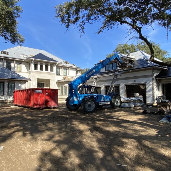 crew installing solar panels on home